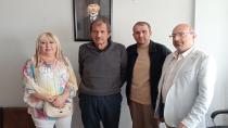 Kerim Sarılar'a Onursal Başkanlık Belgesi